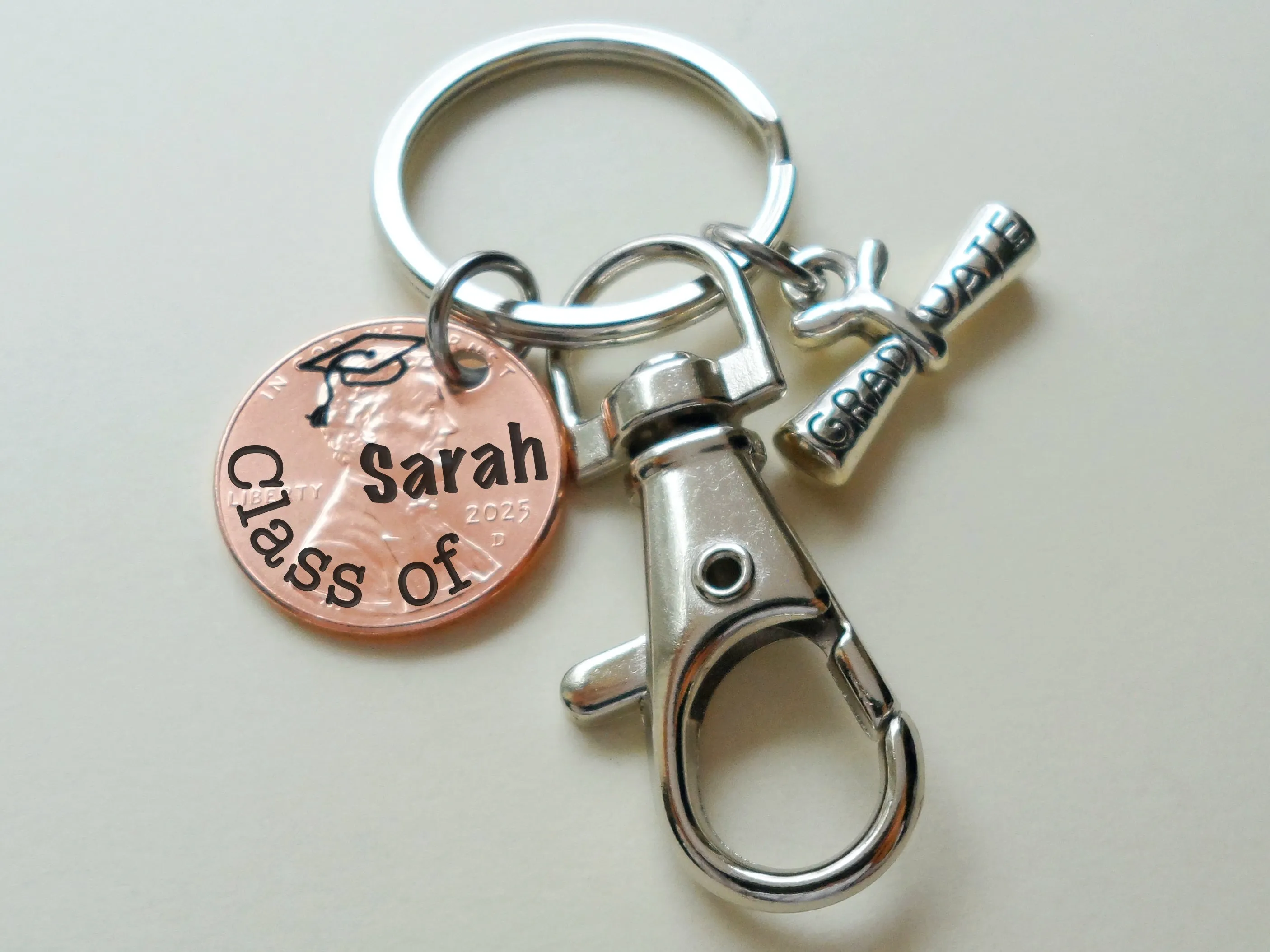"Class Of" Engraved 2025 Penny Keychain with Engraved Graduate Cap & with Graduate Scroll Charm and Clasp